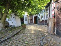 Bild (5d746b49c11c91e2ee9bca96ed586929): Reihenendhaus und Anbau mit historischem Charme, Garage, Innenhof und liebevoll angelegtem Garten