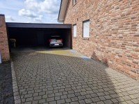 Bild (63fe949016490cead94c3efcc94390ca): Zwei Doppelhaush�lften, jeweils als Zweifamilienhaus mit Doppelcarport, in Br�ggen-Born